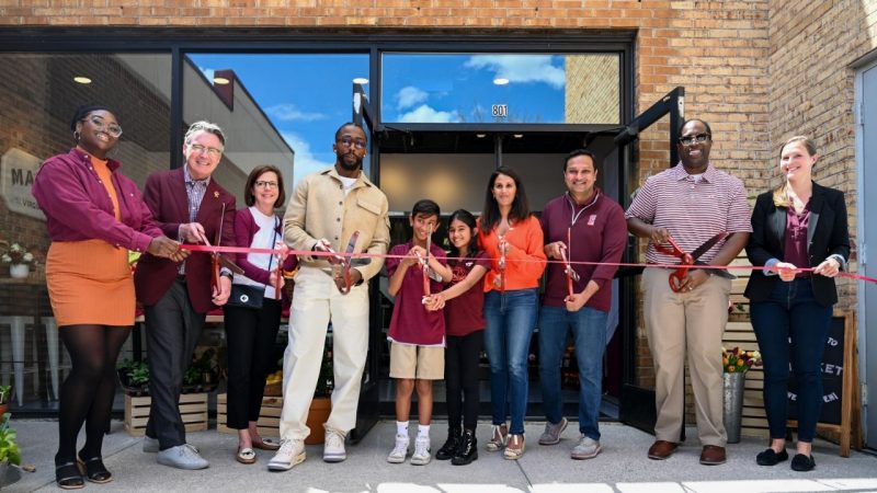 The Market supporters, including Tyrod Taylor as well as Mehul and Hema Sanghani, cut a ceremonial ribbon to celebrate the program's opening