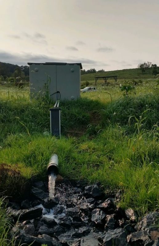 Virginia Tech is measuring the flow and the water chemistry in and out of the Shenandoah Valley spring bioreactor. This picture shows a monitoring unit and the outlet pipe of the bioreactor.  Photo by Paige McKibben
