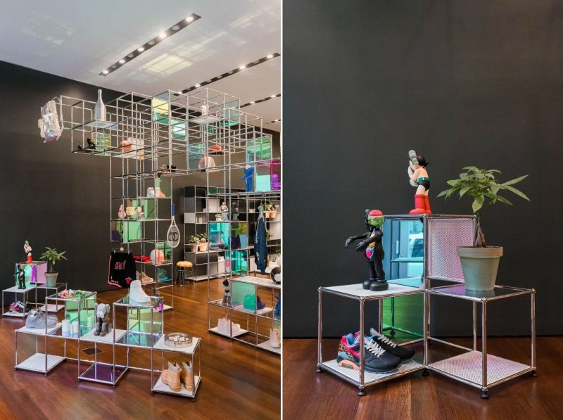 Split image with the left side showing many open cubes stacked from floor to ceiling with items on display and the right side showing a close up of one of the cube formations.