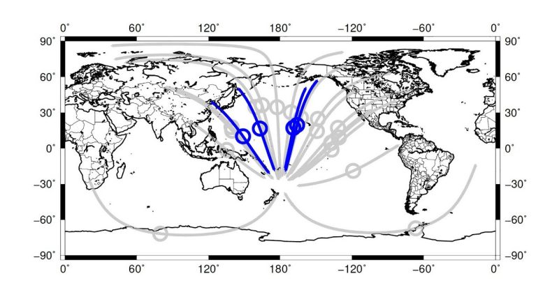 An illustration of the Earth's continents, showing blue lines as seismic waves.