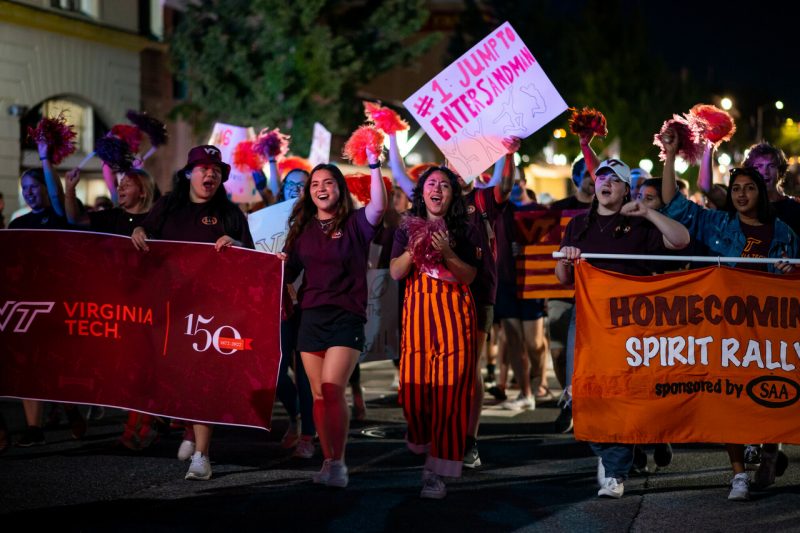 students marching in Homecoming parade