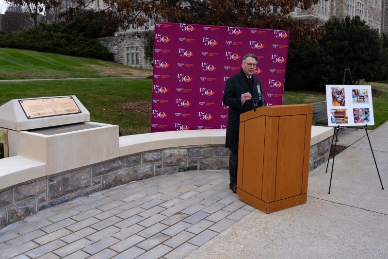 President Tim Sands speaks at the ceremony to dedicate the university's first-ever time capsule, which will be opened in 2072
