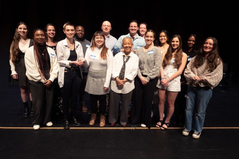 Nikki Giovanni (at center) is surrounded by the finalists of the 2023 Giovanni-Steger Poetry Prize Ceremony. 