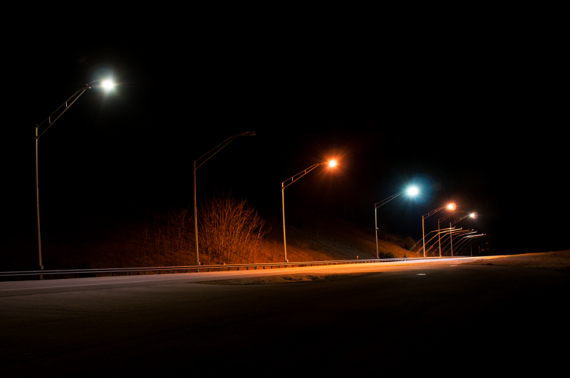 Five different lights illuminated on the Virginia Smart Roads at night.