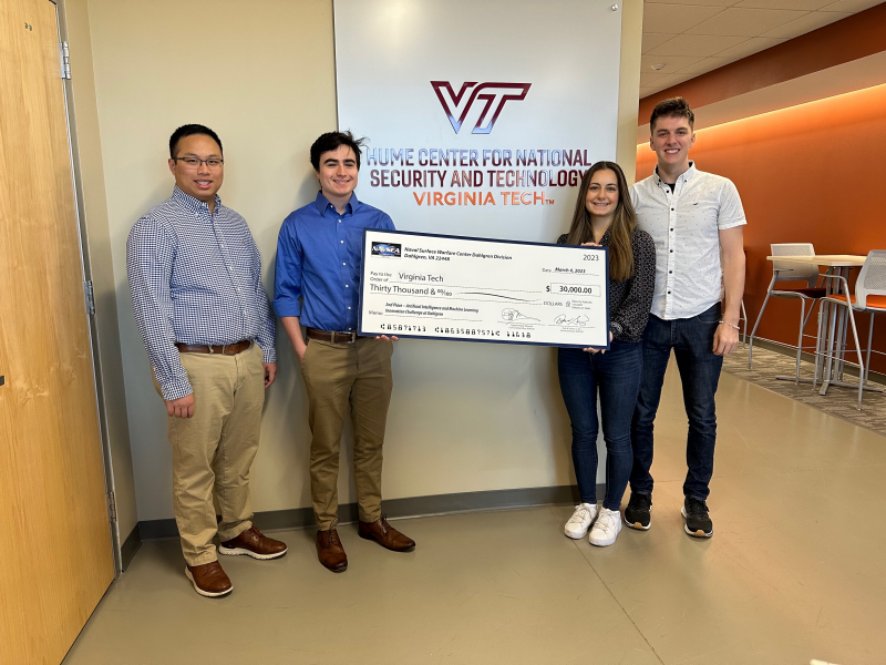 2023 Naval Surface Warfare Center (NSWC) Dahlgren Division Artificial Intelligence and Machine Learning Development Challenge second place winners. From left to right: Anthony Lee, Alex Downey, Danielle Reale, and David Peterson.