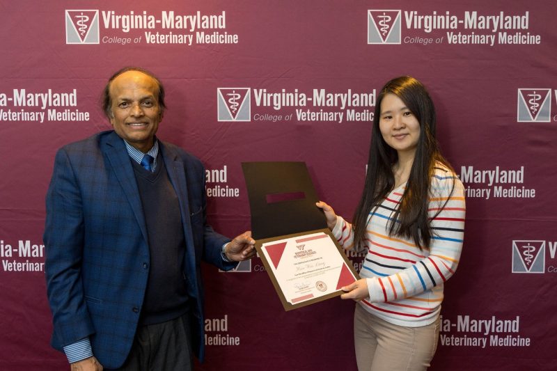 S. Ansar Ahmed and Hsin-Wen Liang at the 2023 Research Symposium Awards.