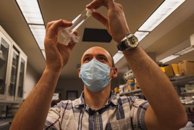 Man holding test tube