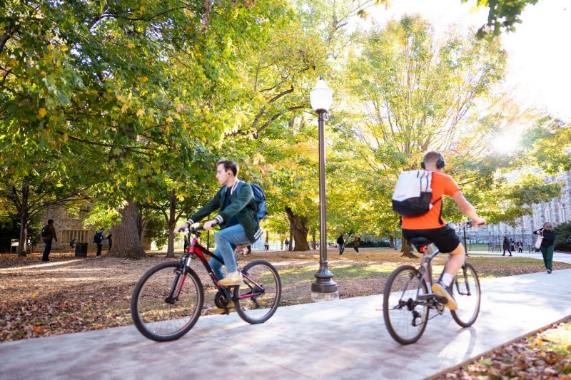 Biking on campus in the fall