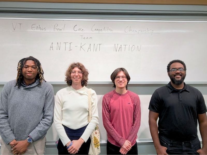 Ethics Bowl team Anti-Kant Nation together following their win. 