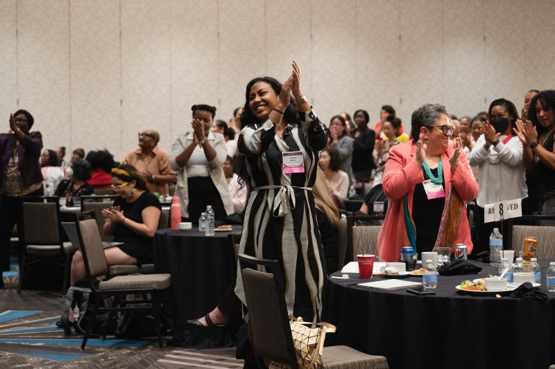 Women celebrating at Virginia Tech’s 2023 Faculty Women of Color in the Academy conference held in Arlington, VA.