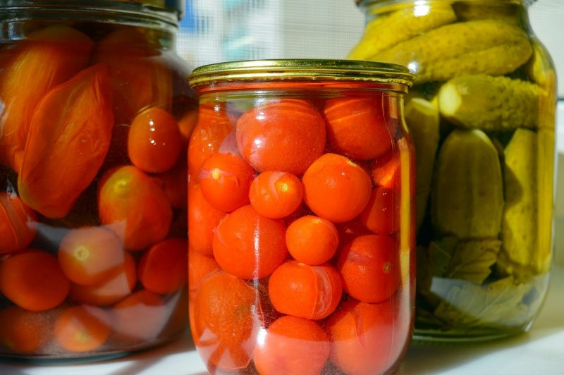 vegetables in jars with pickling liquid