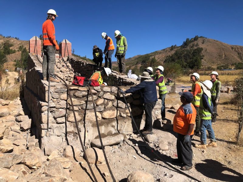 Virginia Tech students working with Bolivian masons