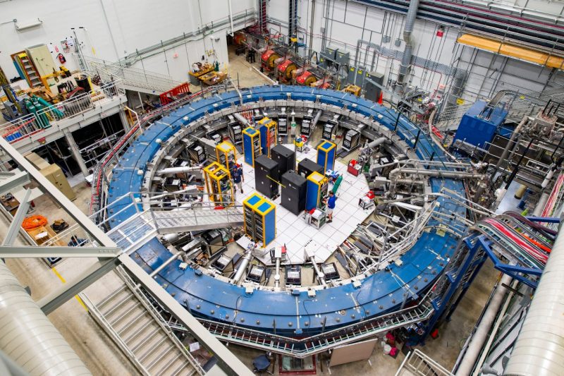 A massive ring-shape particle accelerator inside the FermiLab's lower level.