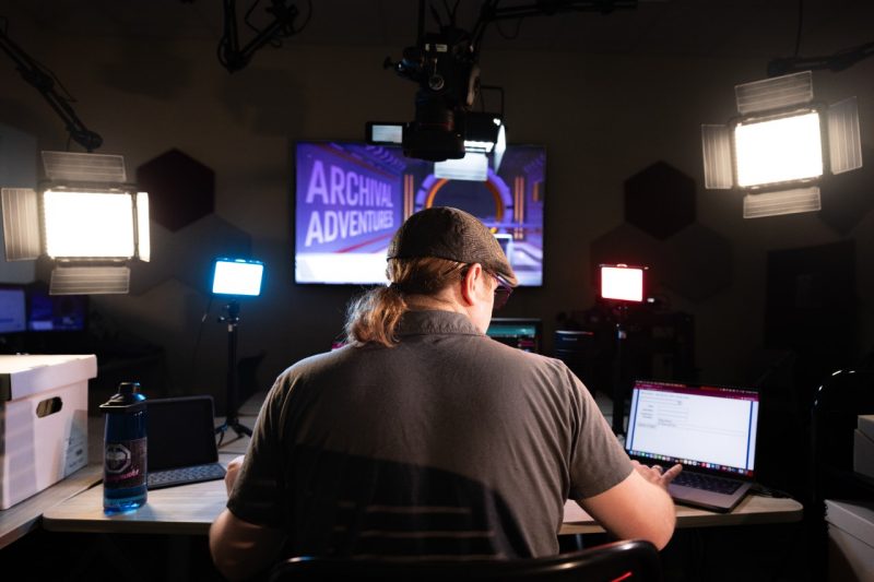 A view of Wright de Hernandez running the equipment during the Archival Adventures Twitch show.