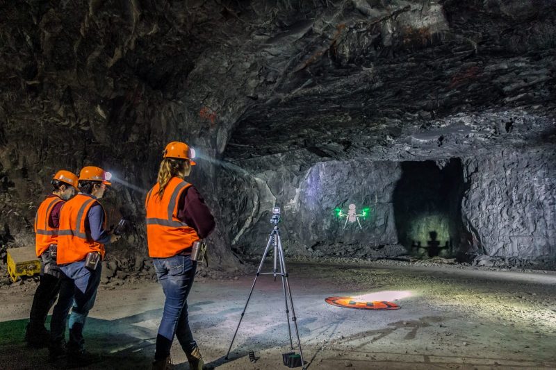 Students make use of a drone inside a mining shaft. Photo by Virginia Tech.