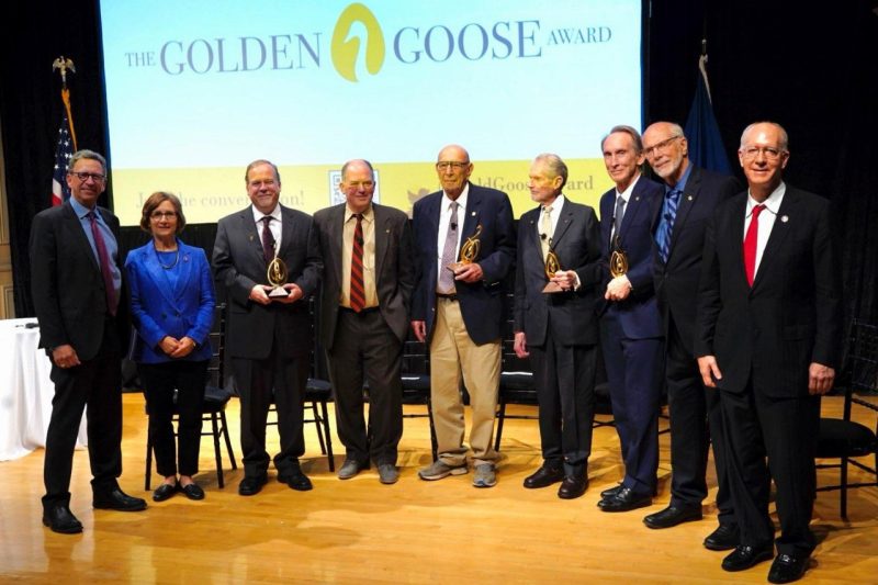 Paul Siegel (fifth from left) stands with other Golden Goose Award recipients.