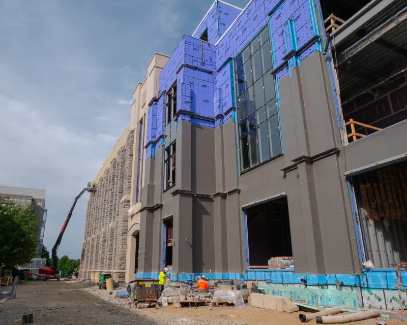 A shot of construction work on the outside of the new Hitt Hall.