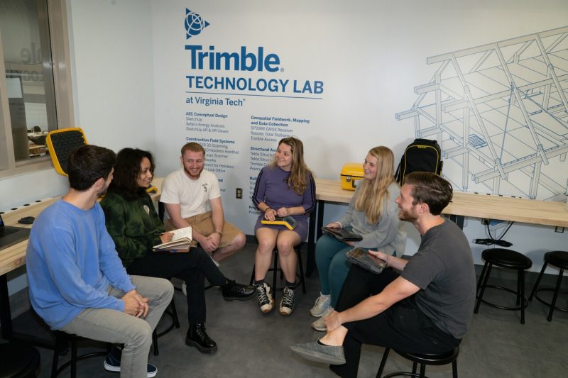 Associate Professor Edward Becker and students from the School of Architecture, in the Trimble Technology Lab. 