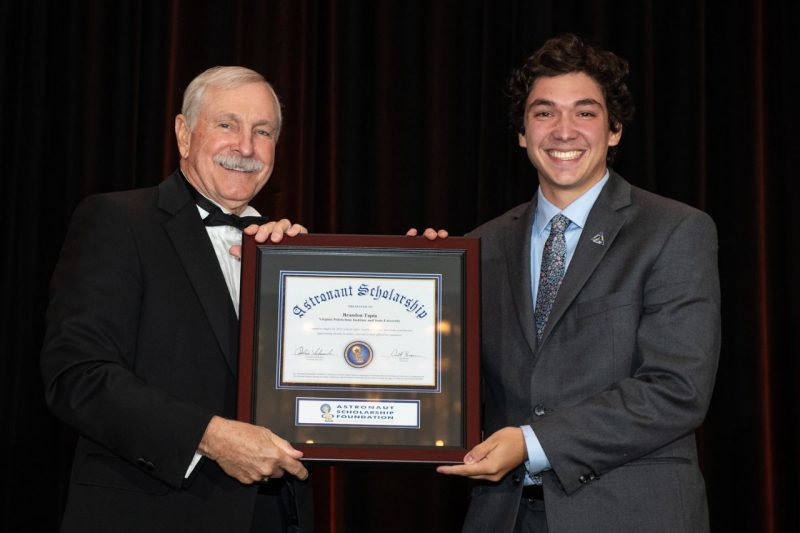 Brandon Tapia receives his award from the Astronaut Scholarship Foundation.