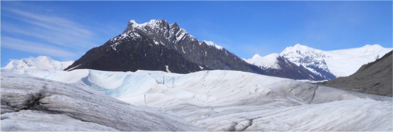 Glacier with mountain in the background.