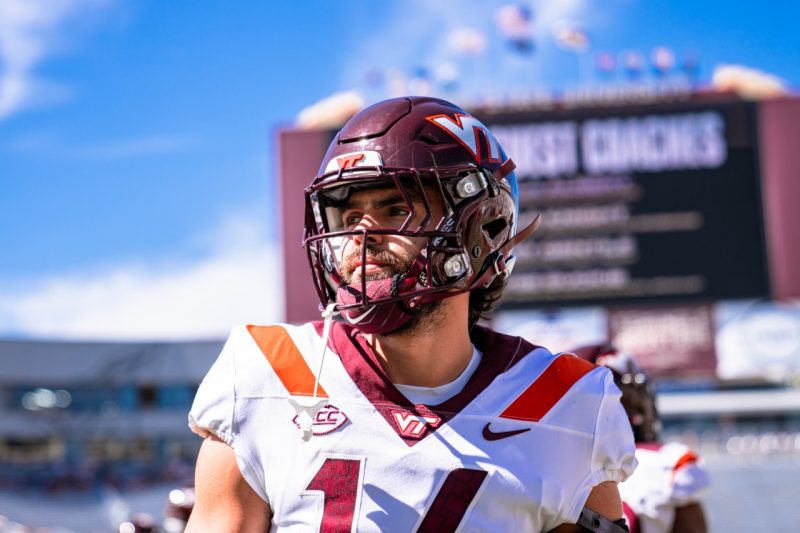 Cole Beck looks off in the distance while sporting a Virginia Tech football uniform against Florida State. Photo by Dave Knachel for Virginia Tech.