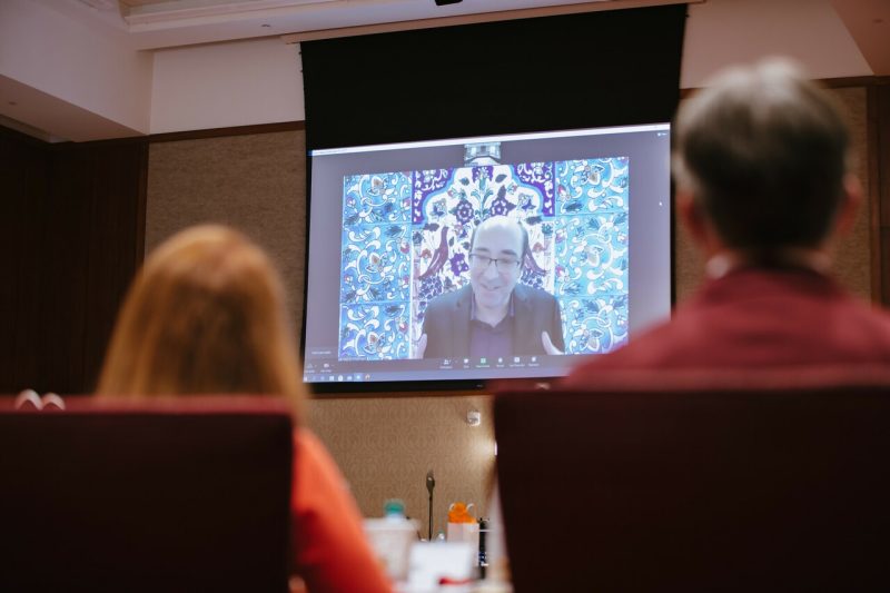Dr. Navid Ghaffarzadegan, Associate Professor in Industrial and Systems Engineering, gives a presentation via Zoom about his Covid-19 prediction models to the Virginia Tech Board of Visitors during the BOV meeting in Latham Ballroom at the Inn at Virginia Tech. (Photo by Christina Franusich/Virginia Tech).
