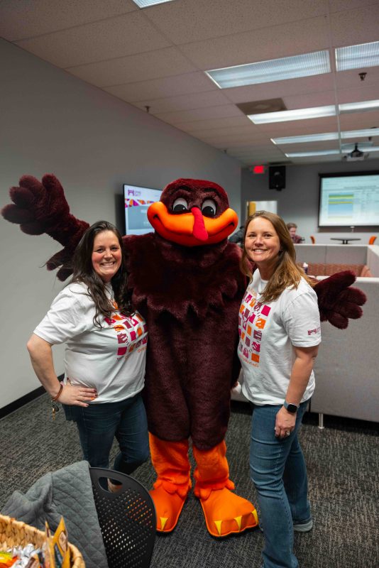 Advancement Division staffers take a break with the HokieBird on Giving Day. 