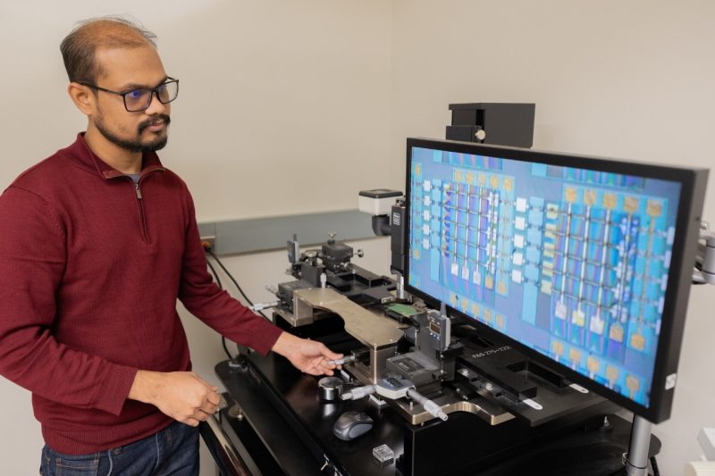 MICS graduate student Md Rubel Sarkar tests a memristor array.