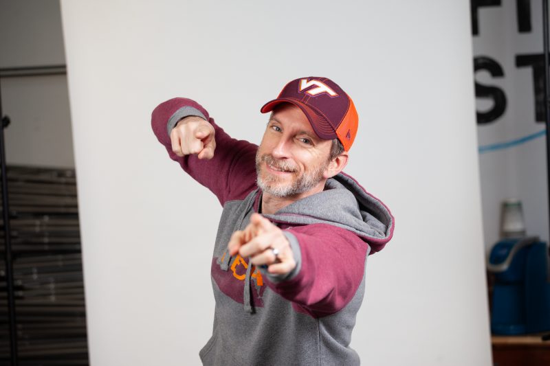 Posed photo of Mike Michalowicz in Virginia Tech apparel