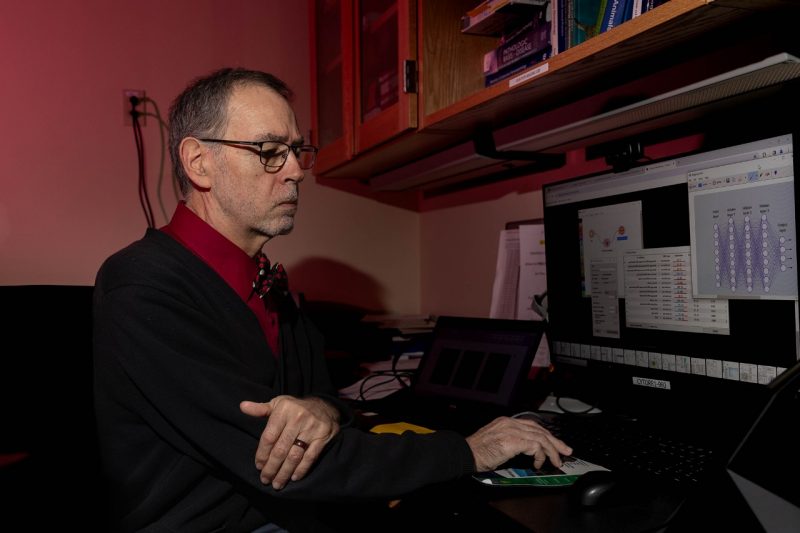 Kurt Zimmerman working on a computer.