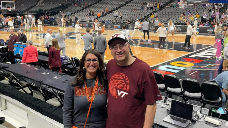 Cherye Tyndall Moore ‘95 (at left) and Stephen Moore ‘95 at the Virginia Tech women’s basketball 2023 Final Four game in Dallas, TX. 