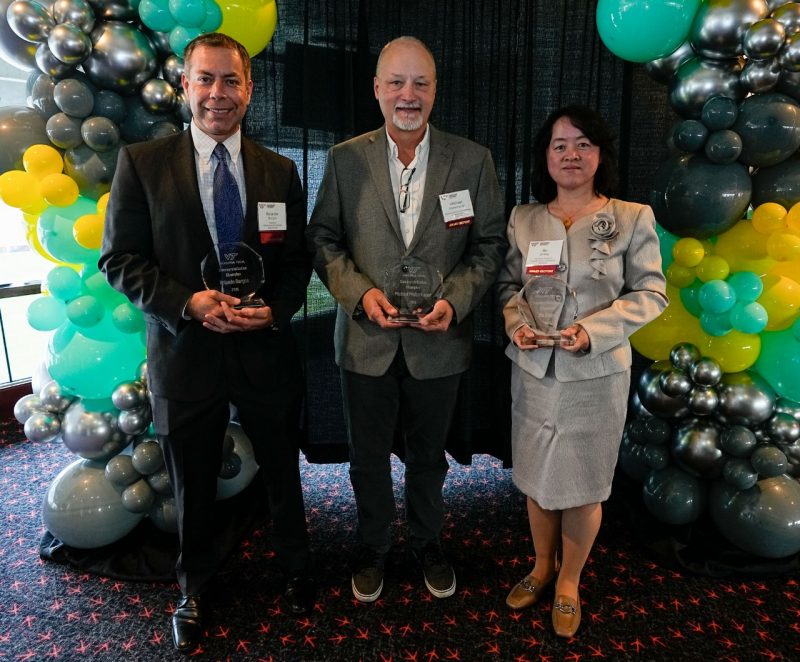 Commercialization Champions (from left): Rolando Burgos, Mike Mollenhauer, and Bo Zhang. Not pictured: Chris Williams. Photo by Lee Friesland