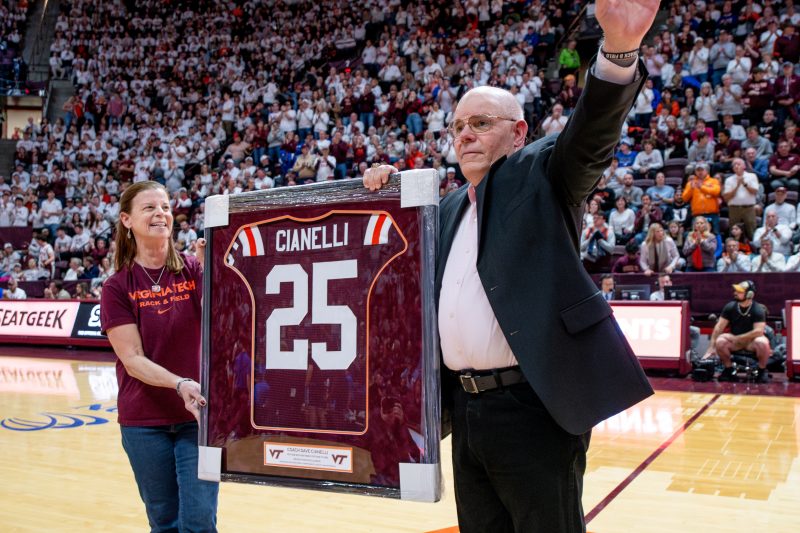 Dave Cianelli and wife Ellen during his recognition at a basketball game