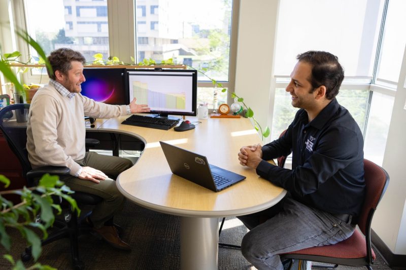 Josh Iorio (left) and Ali Shojaei (right) discuss ongiong research efforts. Ashley Williamson for Virginia Tech.