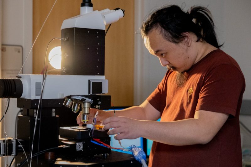 Yuming Zhao in the Multi-Modal Lab ECE graduate student Yuming Zhao prepares to measure biological samples.