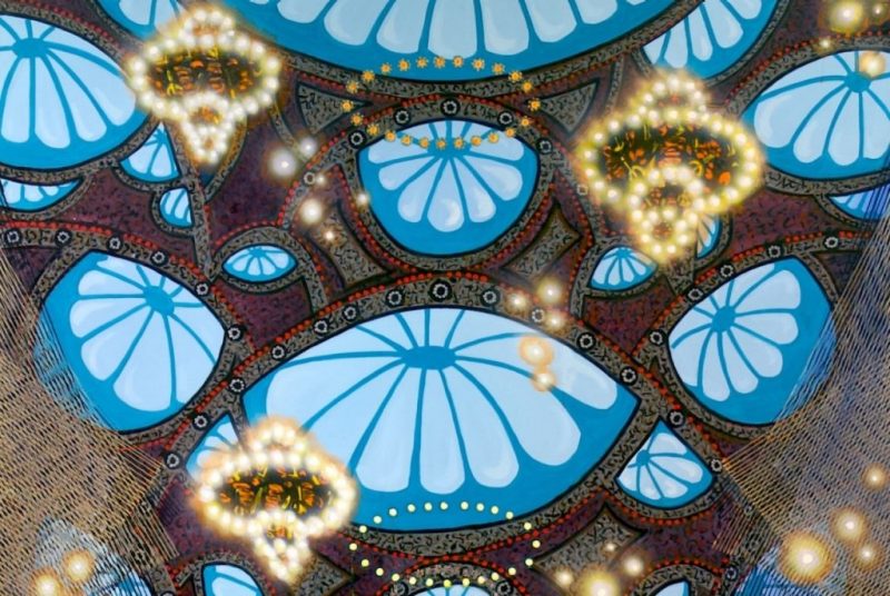 A detail of Michiko Itatani's "'Bluelift' painting from Cosmic Theater 23-B-5," 2023, an oil on canvas work of a liminal space that looks like an expansive lobby with sacred geometry and many lit chandeliers hanging from the ceiling.