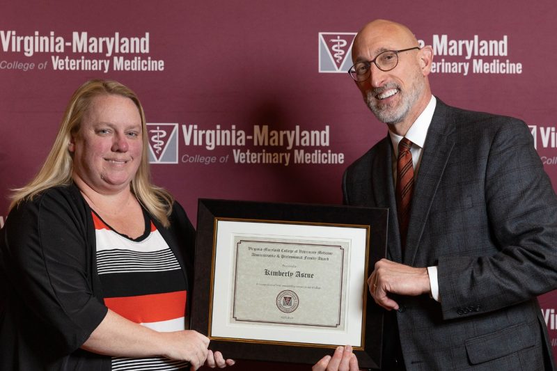 Faculty Awards 2024 Dean M. Dan Givens giving Kimberly Ascue the Administrative and Professional Faculty Award at the Faculty Awards in April of 2024 at the Virginia Tech Inn.