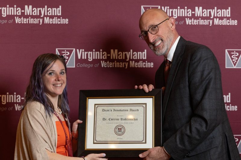 Faculty Awards 2024 Dean M. Dan Givens giving Dr. Corrine Ruktanochai the Dean’s Innovation Award at the Faculty Awards in April of 2024 at the Virginia Tech Inn.