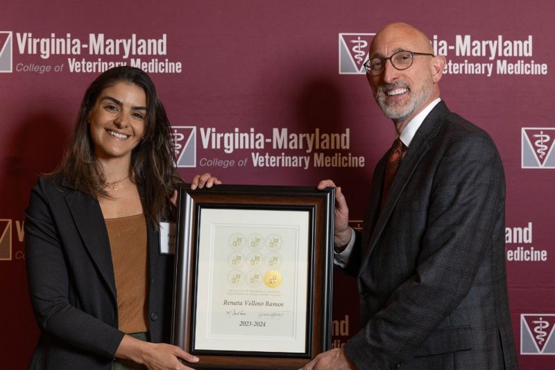 Faculty Awards 2024 Dean M. Dan Givens giving Dr. Renata Velloso Ramos the Certificate of Teaching Excellence at the Faculty Awards in April of 2024 at the Virginia Tech Inn.