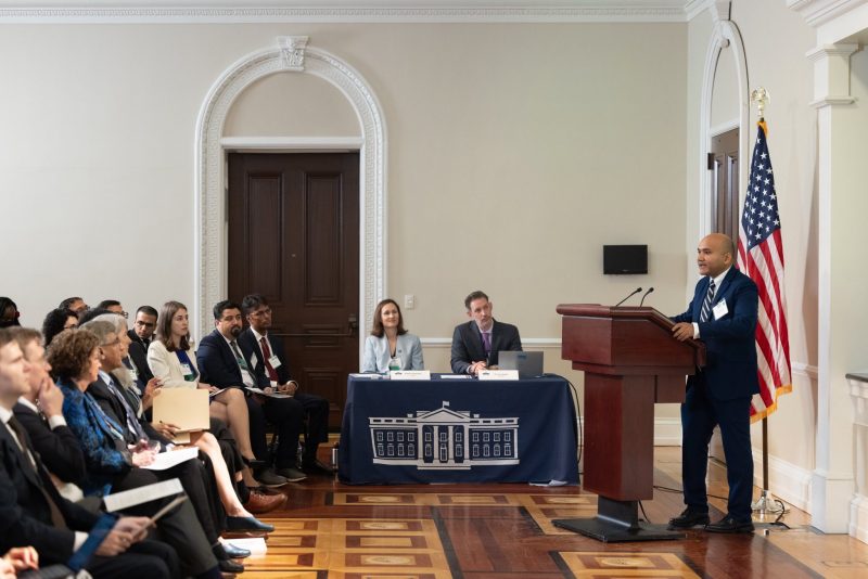 Anuj Karpatne addressing audience from behind a podium at an event in the White House on May 6 to announce the NAIRR Pilot program award winners