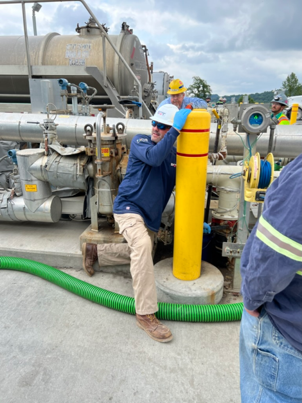 Engineers helping collect produced water.