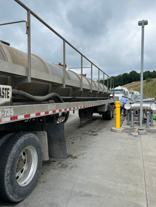 Trucks lining up to empty produced water.