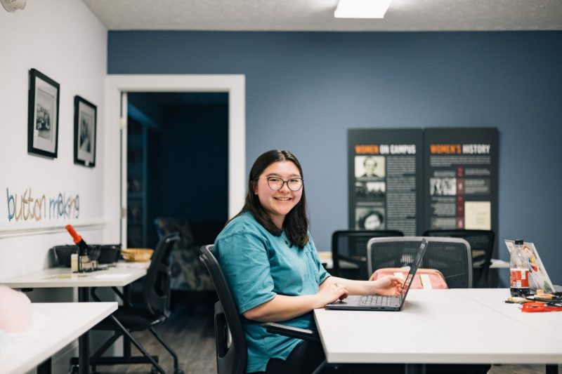 Elisabeth Wasserman works at a laptop in the basement of the Women's Center.
