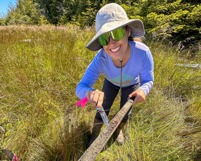 TinaandCore Tina Dura demonstrates a core sample that shows the different stratifications in the sediment. Photo courtesy of Tina Dura.