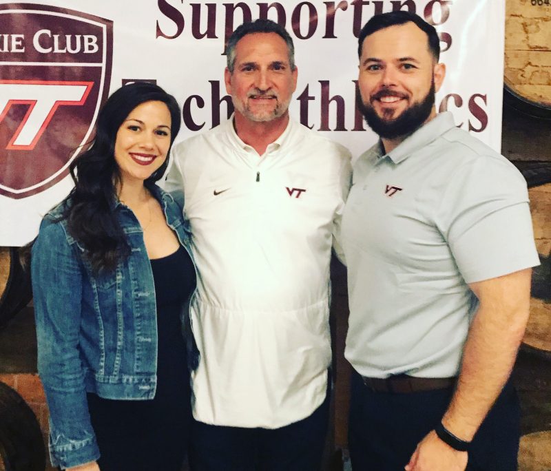 Kyle Bailey, wife Camille, and Bud Foster