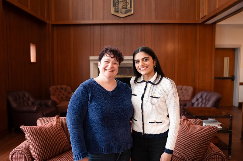 (From left) Julie Byrd standing next to Rabihah Waheed inside a room on campus