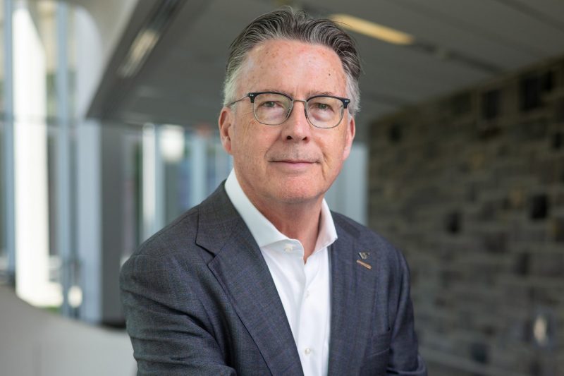 President Tim Sands poses for a portrait inside the Moss Arts Center