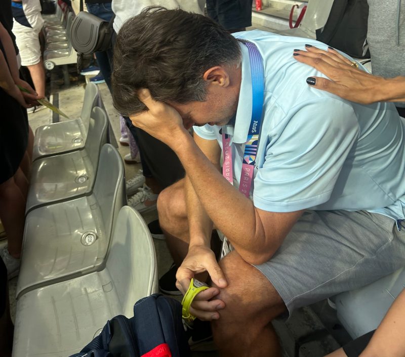 Ben Thomas becoming emotional after Cole Hocker's Olympic win