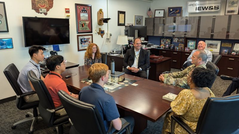 DCTC photo Virginia Tech and Purdue University students in the Defense Civilian Training Corps program (eft to right: Sangmuk Kang, Josemari Roque, Faith Jones, and Jackson Migala) presenting research developed during their 2024 summer internships to members of the U.S. Army Program Executive Office – Intelligence, Electronic Warfare & Sensors. Photo courtesy of Sangmuk Kang.