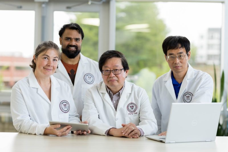 (From left) C. Lynn Heffron, Kush Yadav, X.J. Meng, and Debin Tian. Photo by Andrew Mann for Virginia Tech.